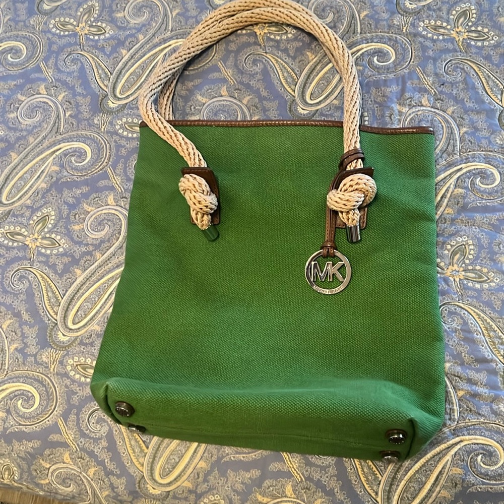 Michael Kors green fabric bag.